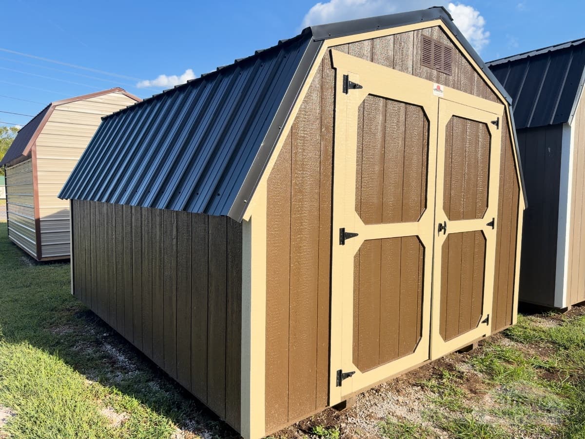 10x12 Barn, dark clove walls · crewel tan trim · black roof, in stock in Decatur