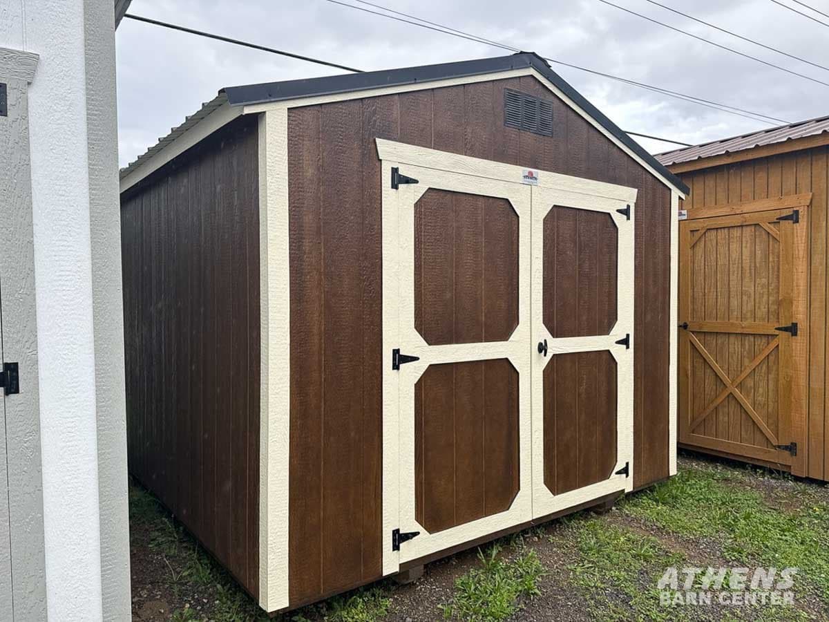 10x12 Utility — W. Chestnut walls · Navjo trim · Black roof