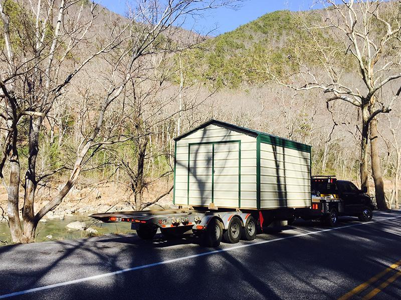 metal shed with double doors on the shed delivery trailer